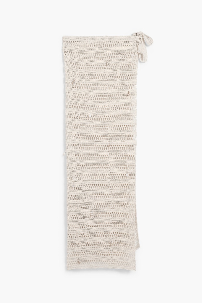 Openwork pareo with appliqués 